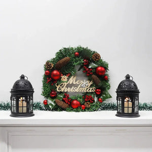 JHY DESIGN 8.5-inch high decorative candle lanterns, set of 2, black metal, displayed with a Christmas wreath.