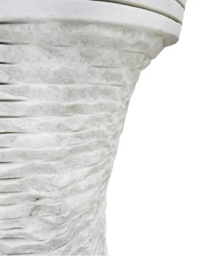 Carrara white marble pedestal sink with a textured ribbed pedestal.