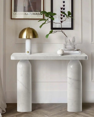 Console table in Carrara white marble with polished round legs