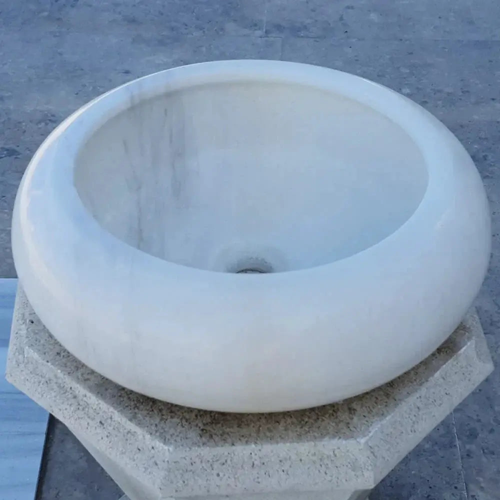 Carrara white marble vessel bathroom sink, round polished bowl for above-counter vanity, 15.5 in diameter, 6 in high.