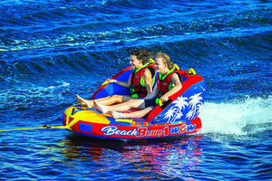 Beach Bubba 2P towable raft by WOW Watersports, red and blue with palm tree graphics, for two riders