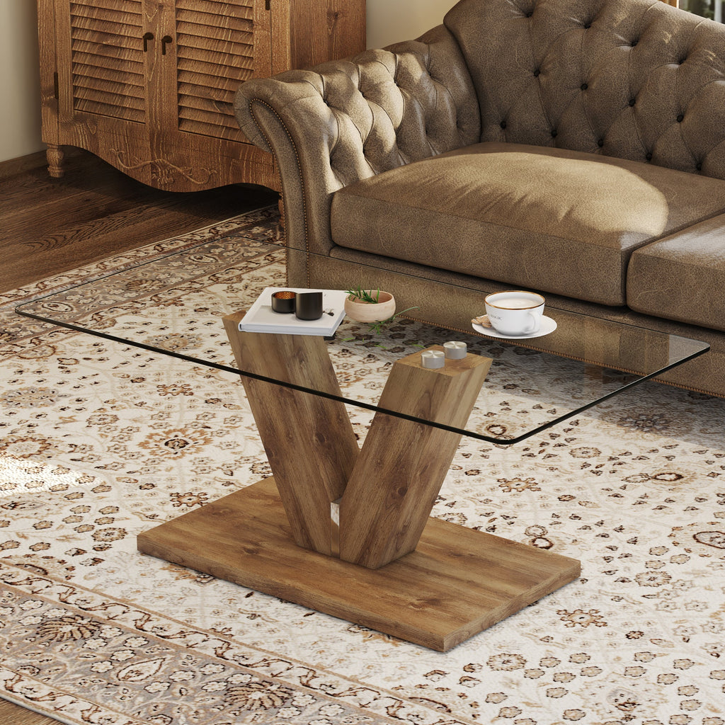 A modern minimalist style coffee table. Transparent tempered glass tabletop with wooden MDF columns. Suitable for living room and dining room.  CT-V