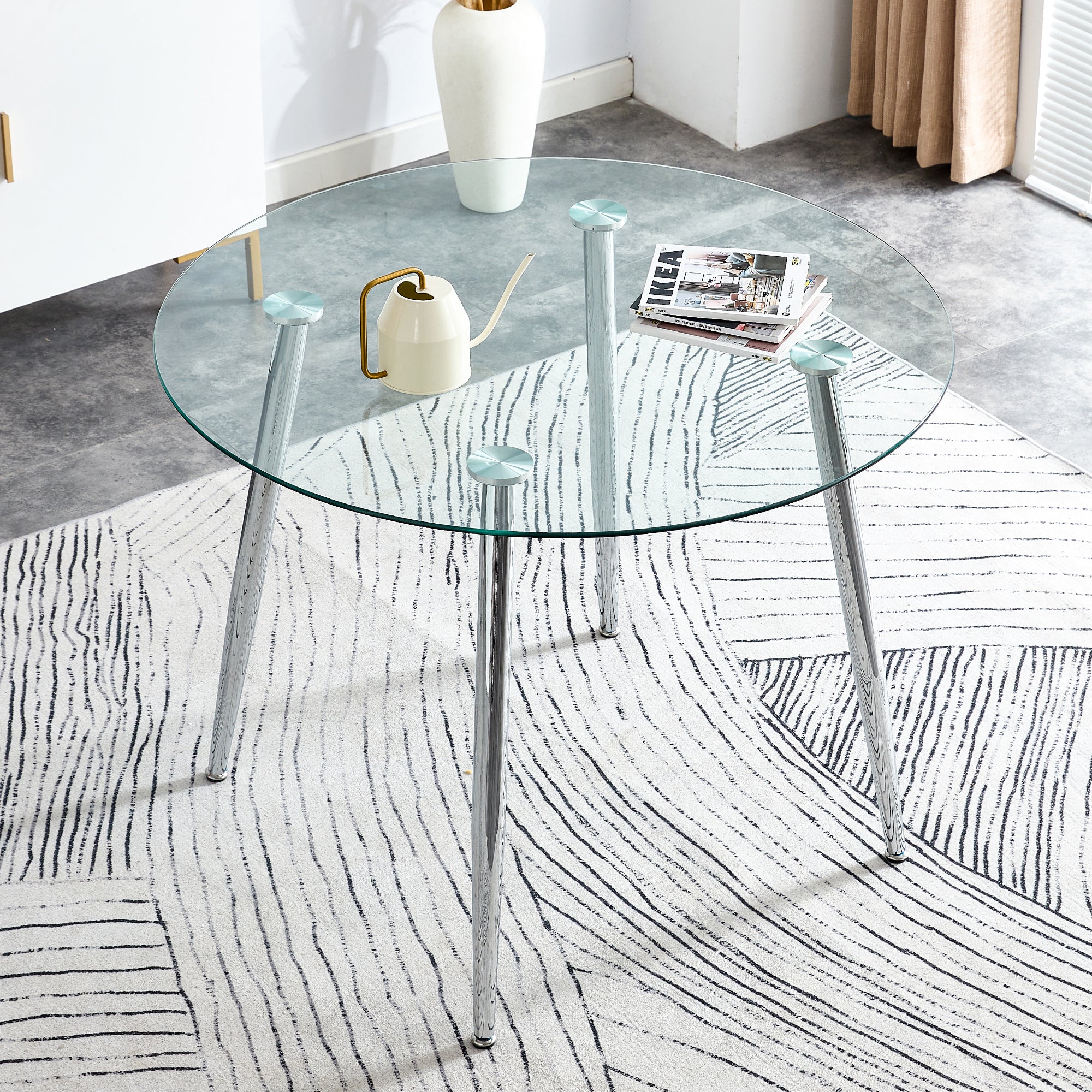 A glass tabletop with a diameter of 40 inches and a modern minimalist circular dining table with silver metal legs.Suitable for living rooms, and conference rooms.W1151S03392