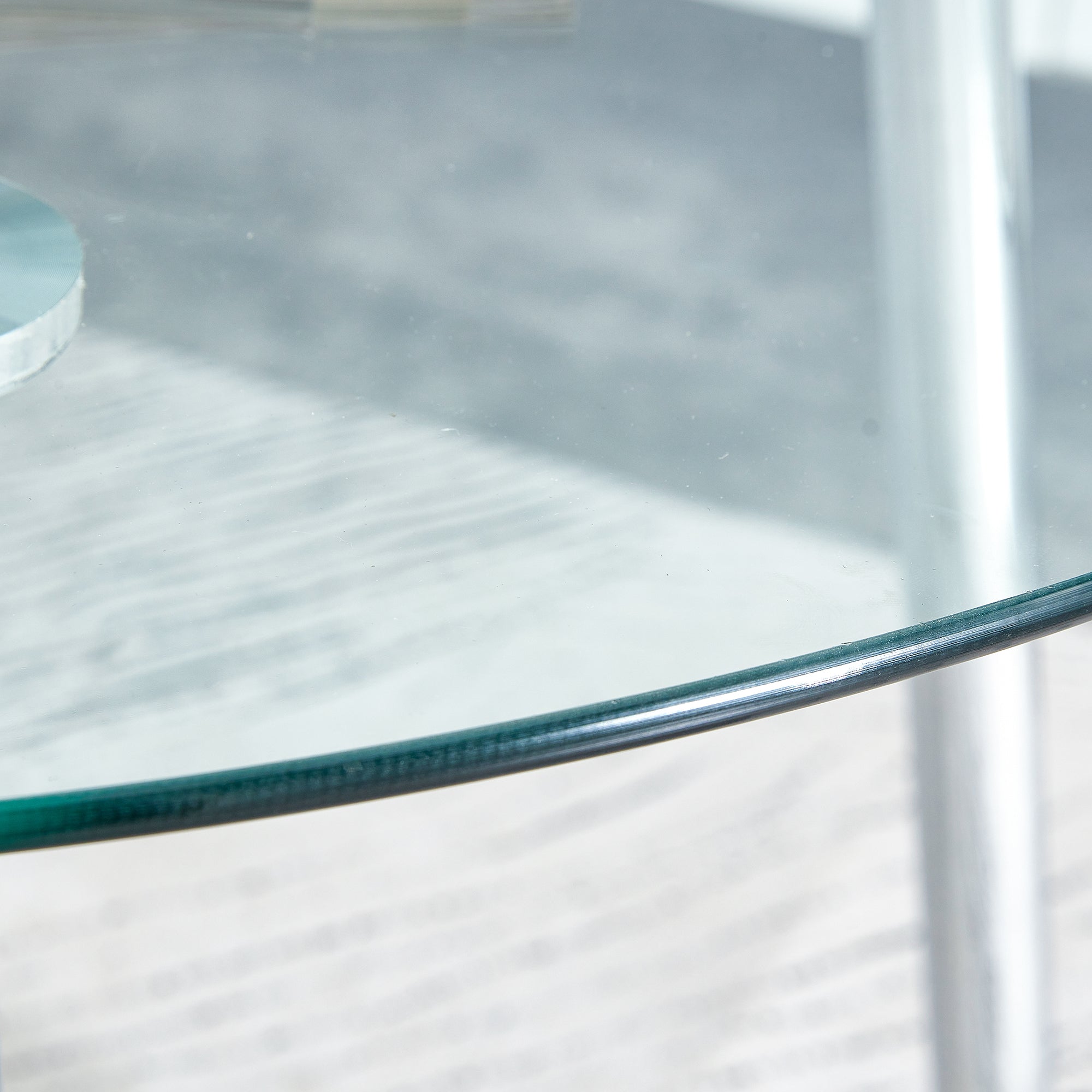 A glass tabletop with a diameter of 40 inches and a modern minimalist circular dining table with silver metal legs.Suitable for living rooms, and conference rooms.W1151S03392