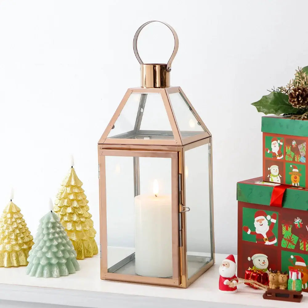 16-inch high decorative lantern by JHY DESIGN, rose-gold glass candle lantern with a lit candle inside