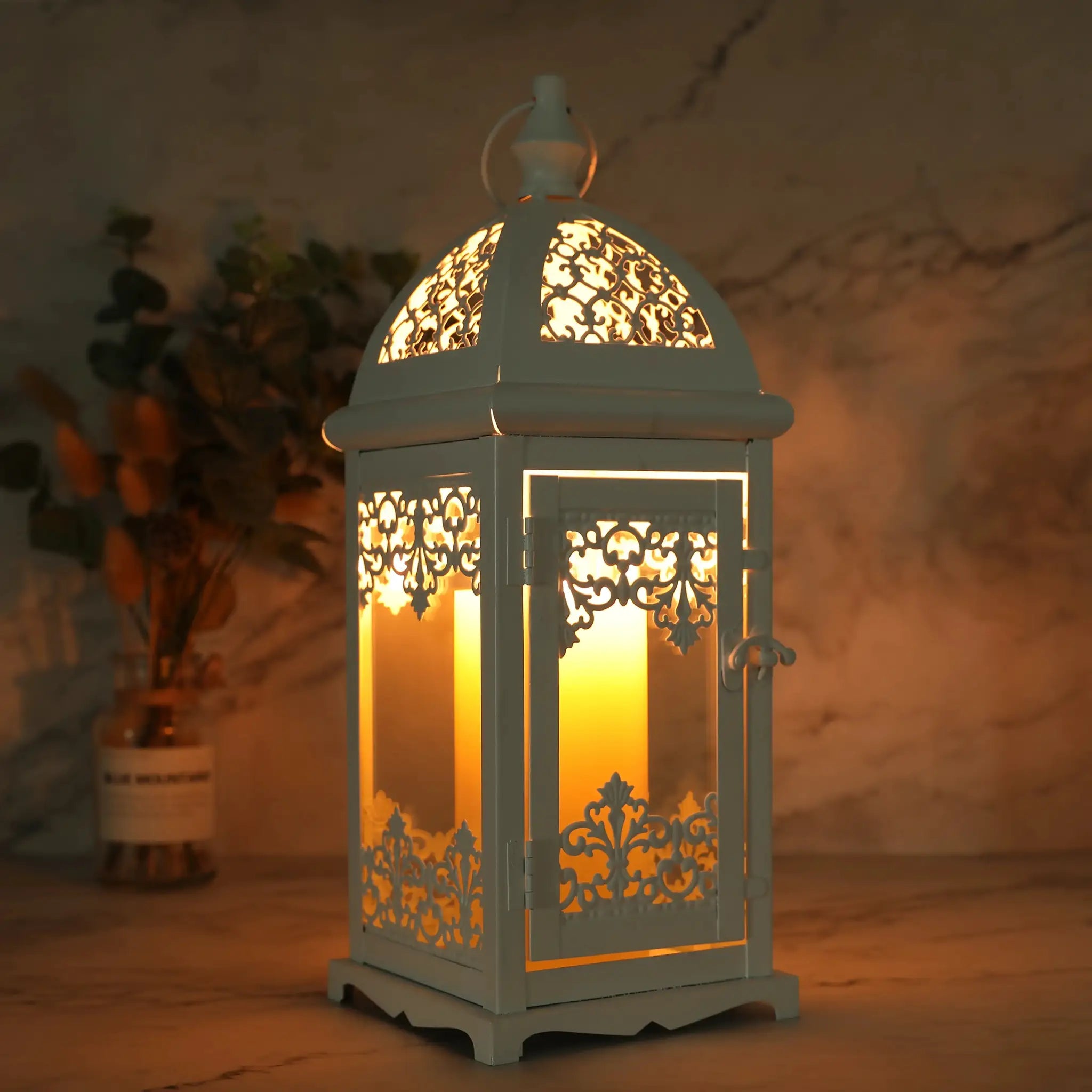 15-inch high decorative candle lantern by JHY DESIGN, white metal with intricate lattice panels and warm glow
