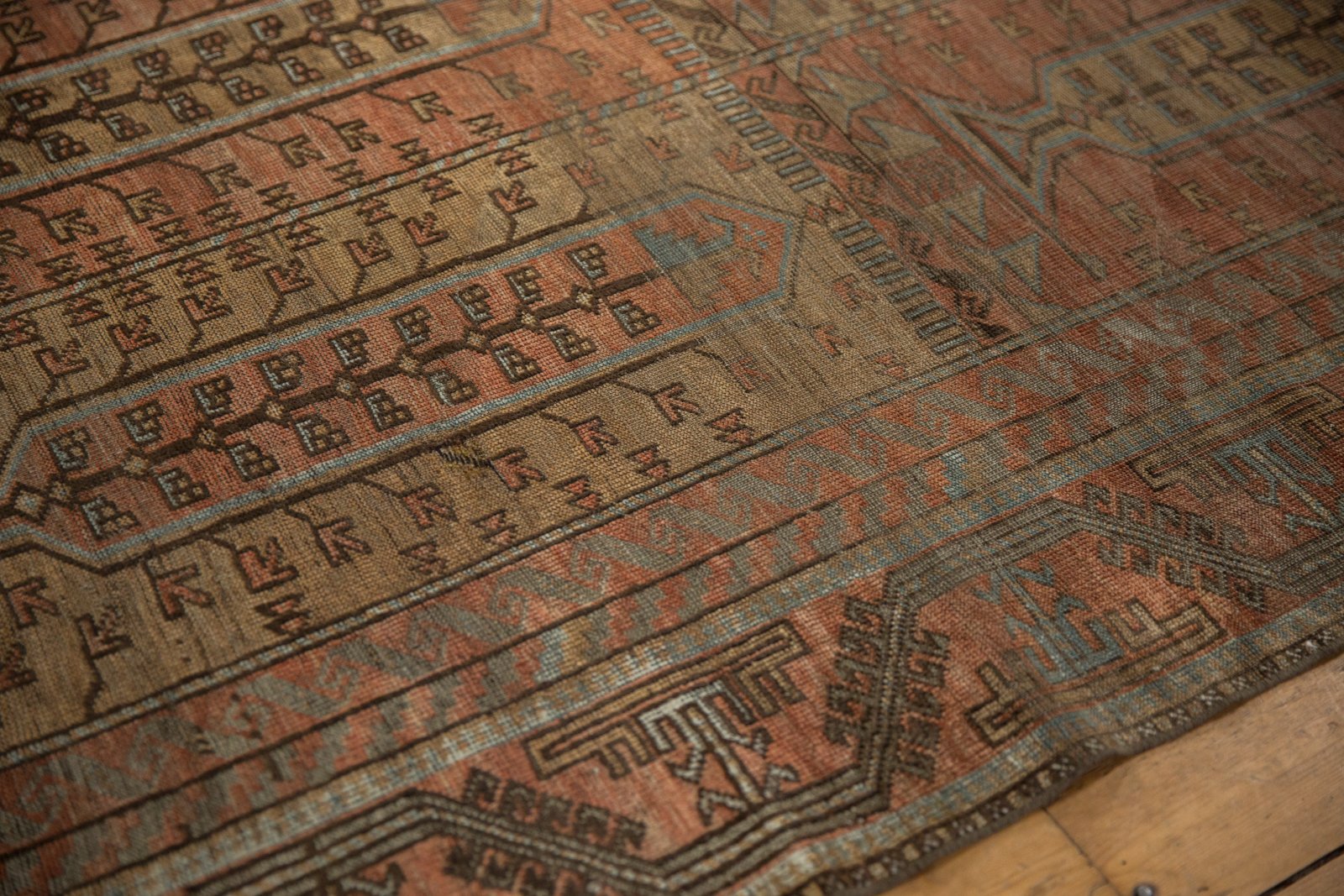 5.5x10 Vintage Distressed Belouch Carpet