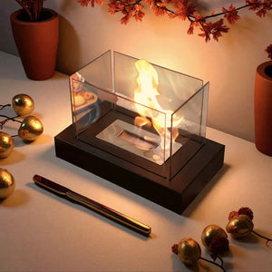 360° Rectangular tabletop fire bowl with four-sided glass panels on a black base, ethanol flames