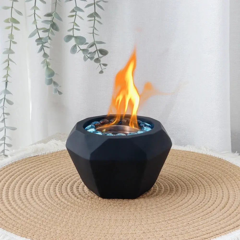 6x4 Portable Cement Tabletop Fireplace by JHY DESIGN, black geometric base with blue decorative stones