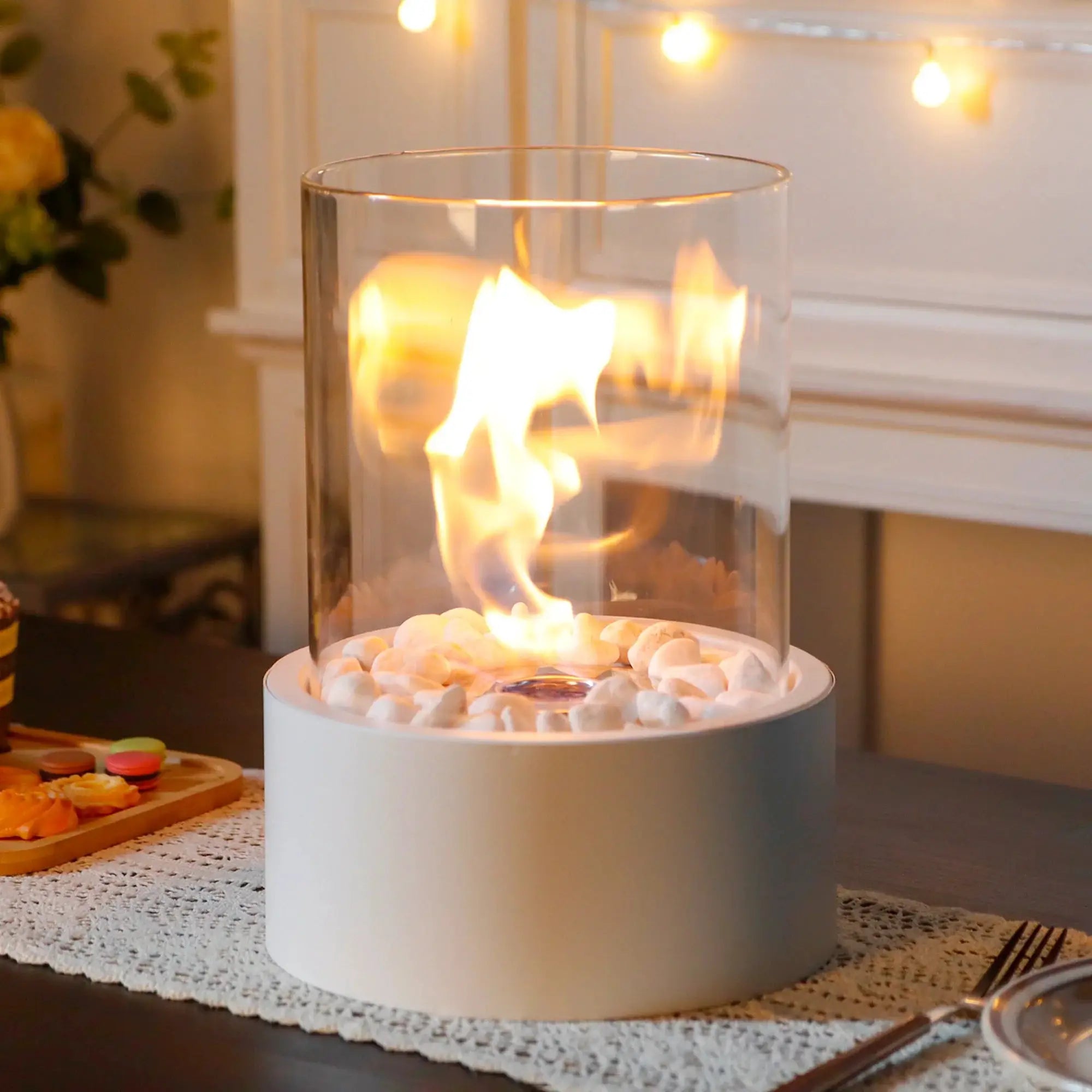 JHY DESIGN 11H Large Tabletop Fire Bowl Pot Fireplace, clear glass cylinder with stone bed on white base.