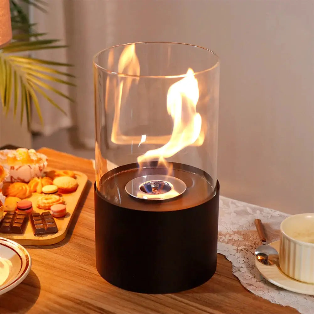 11.5-inch high tabletop fire bowl fireplace with glass cylinder and black base, gel/ethanol burner