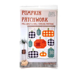 Pattern: Pumpkin Patchwork Quilt and Wall Hanging by Block Party Quilt Co; fabric pattern.