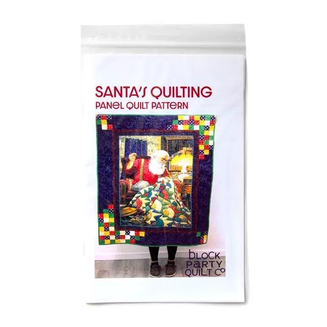 Quilting Santa Panel Quilt Pattern by Block Party Quilt Co for an easy throw quilt.