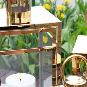 Gold stainless steel decorative candle lanterns set of 3 (12, 15, 19 in) by JHY DESIGN