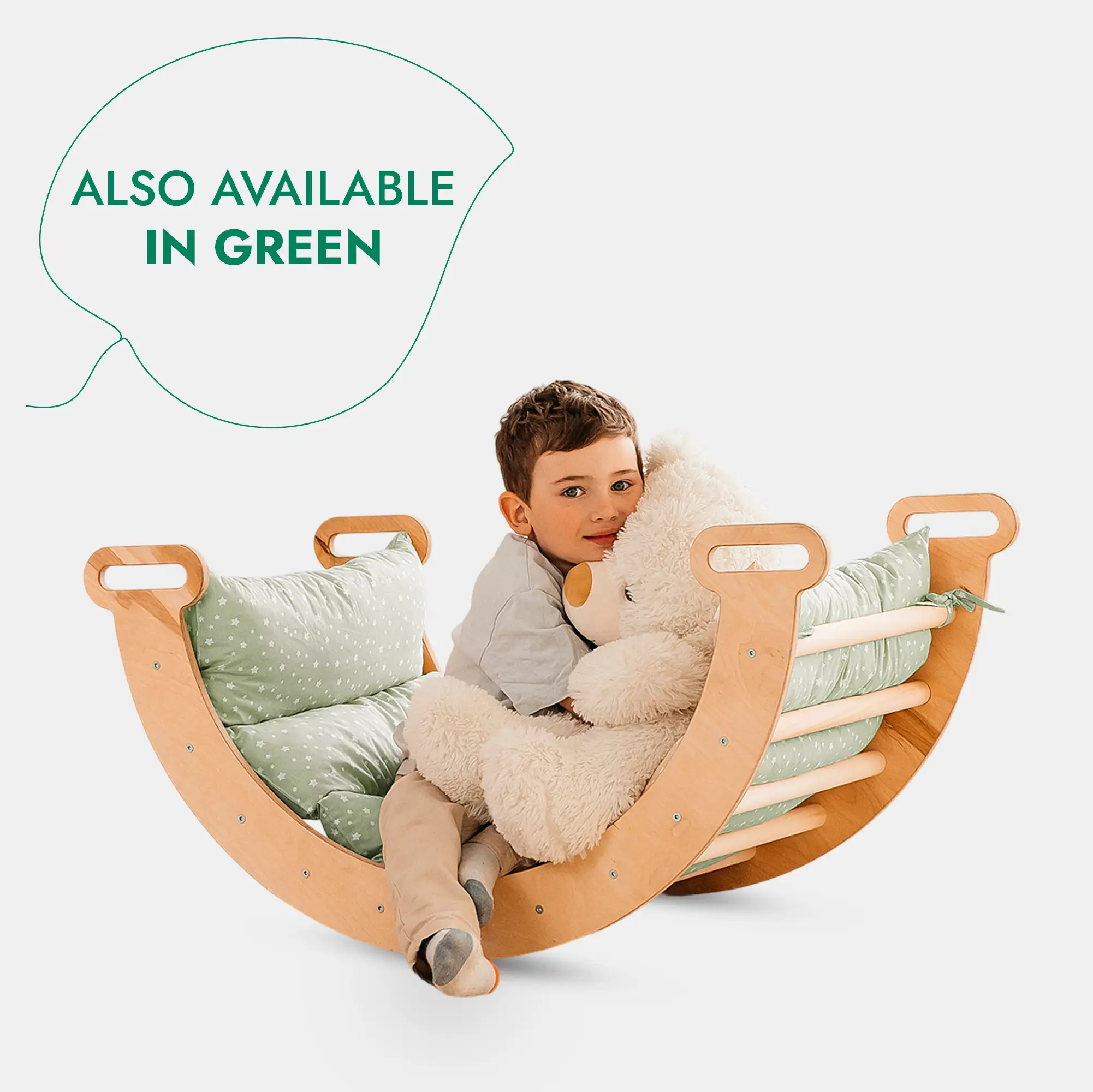 Goodevas 5in1 Montessori Climbing Set wooden rocker with green star cushions; two kids and a teddy bear.