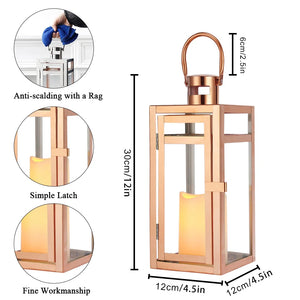 12-inch tall rose gold metal decorative candle lantern by JHY DESIGN with glass panels and hanging handle.