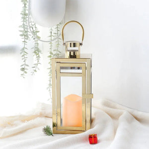 12-inch gold metal decorative candle lantern with glass panels and loop handle.