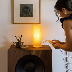 Woogie Table Lamp by Terra Labs, yellow curved ribbed body