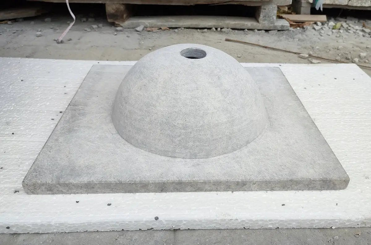 Tundra Grey Marble bathroom vanity with round sink on rectangular honed base