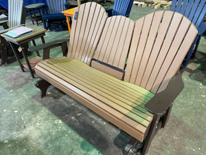 5-foot glider fanback outdoor bench by Wooden Whale Workshop; tan wood slats, dark brown arms.
