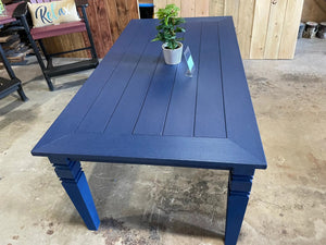 Java Leg outdoor dining table, handcrafted in deep blue with a slatted top