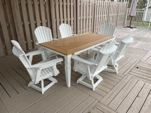 Java Leg Outdoor Dining Table with natural wood chevron top and white base on a wooden deck
