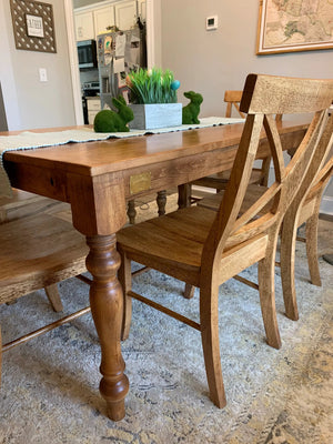 Single X Chair set of 4; natural wood dining chairs by Wooden Whale Workshop around a dining table