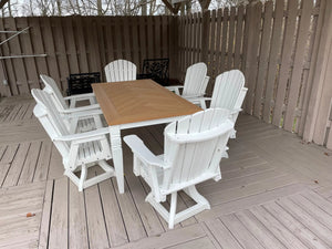 Java Leg Outdoor Dining Table with a natural wood top surrounded by white Adirondack chairs on a deck.