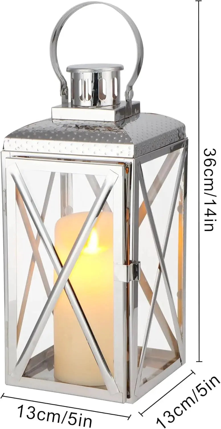 14in square stainless steel candle lantern by JHY DESIGN with glass panels and a lit candle