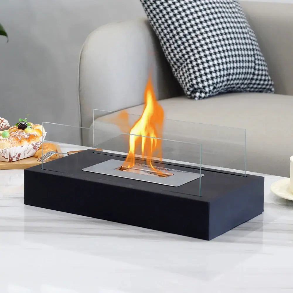 Square tabletop fire bowl with two glass panels on a black base by JHY DESIGN, gel/ethanol fireplace.