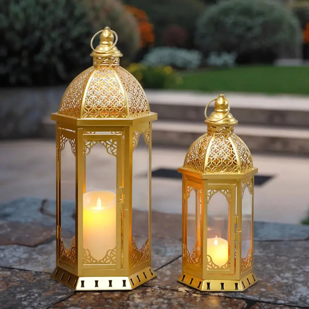Set of 2 vintage metal candle lanterns, 22in and 17in tall, gold with intricate lattice design