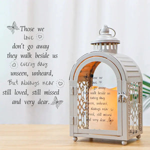 11'' High Memorial Lantern with Automatic Timer by JHY DESIGN, grey metal lantern with glass panels and a lit candle inside.