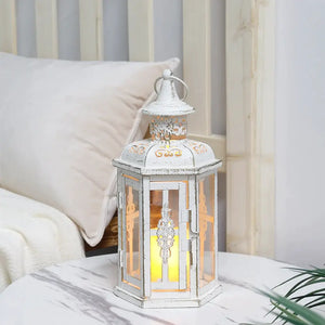 10 inch vintage-style hanging lantern metal candleholder in white distressed finish with warm glow