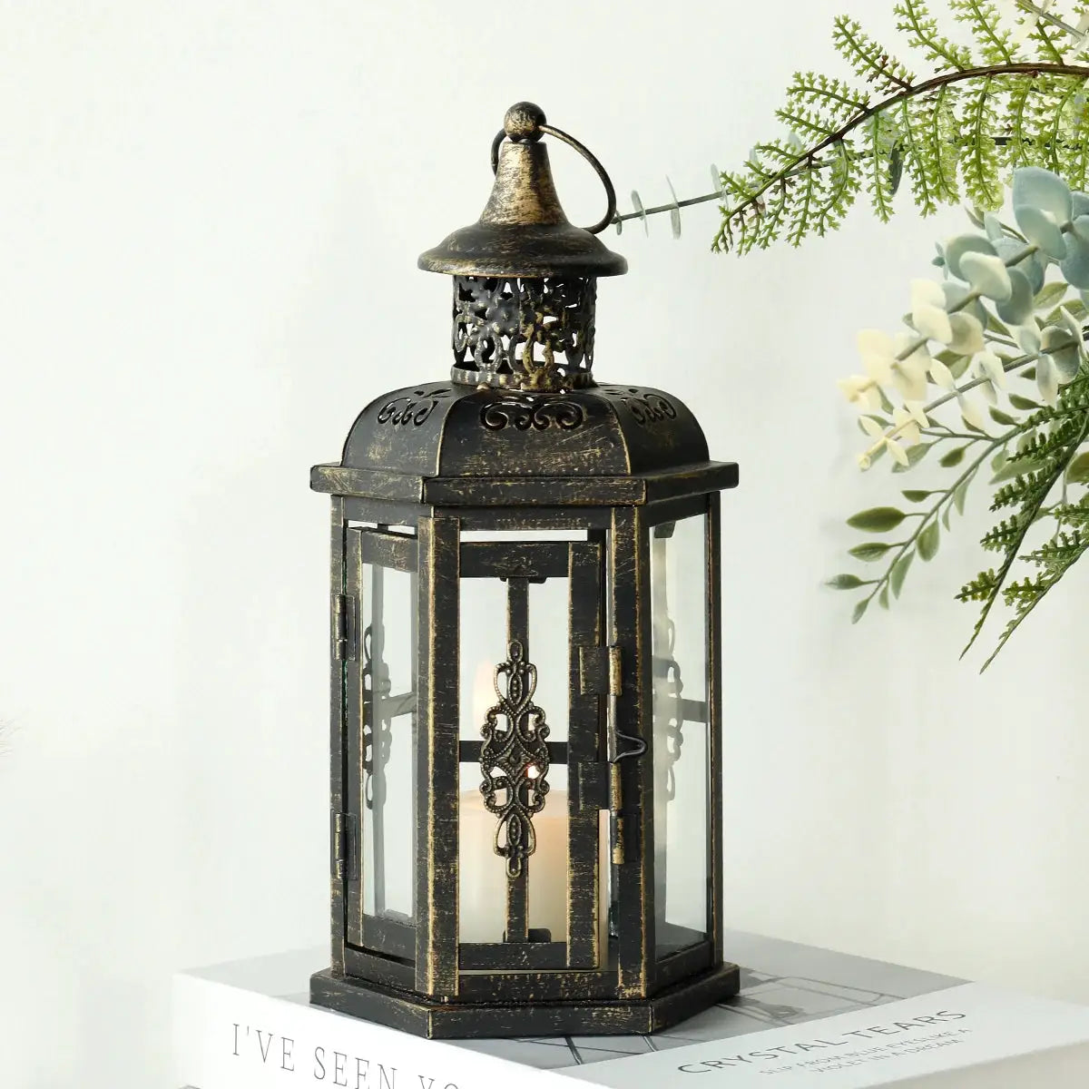 JHY DESIGN decorative candle lantern, 12-inch tall black metal with antique gold brush finish and glass panels.