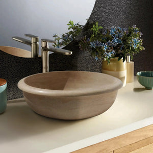 Light beige travertine stone bathroom vanity sink with brushed nickel faucet