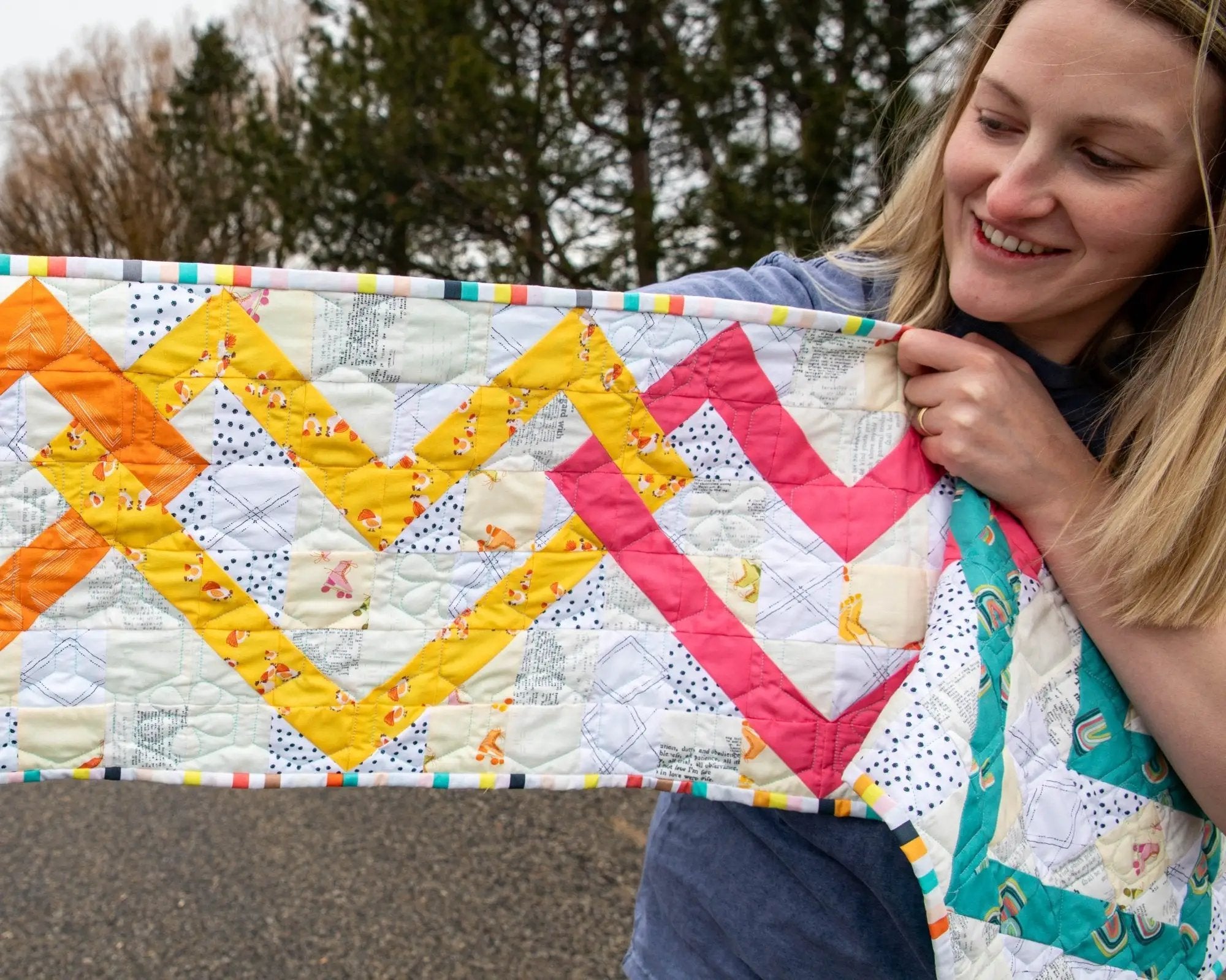 Linked Hearts Quilted Table Runner Pattern by Block Party Quilt Co; multicolor patchwork triangles