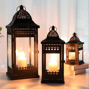 JHY DESIGN decorative candle lanterns set of 3 in black metal with intricate lattice panels and warm glow