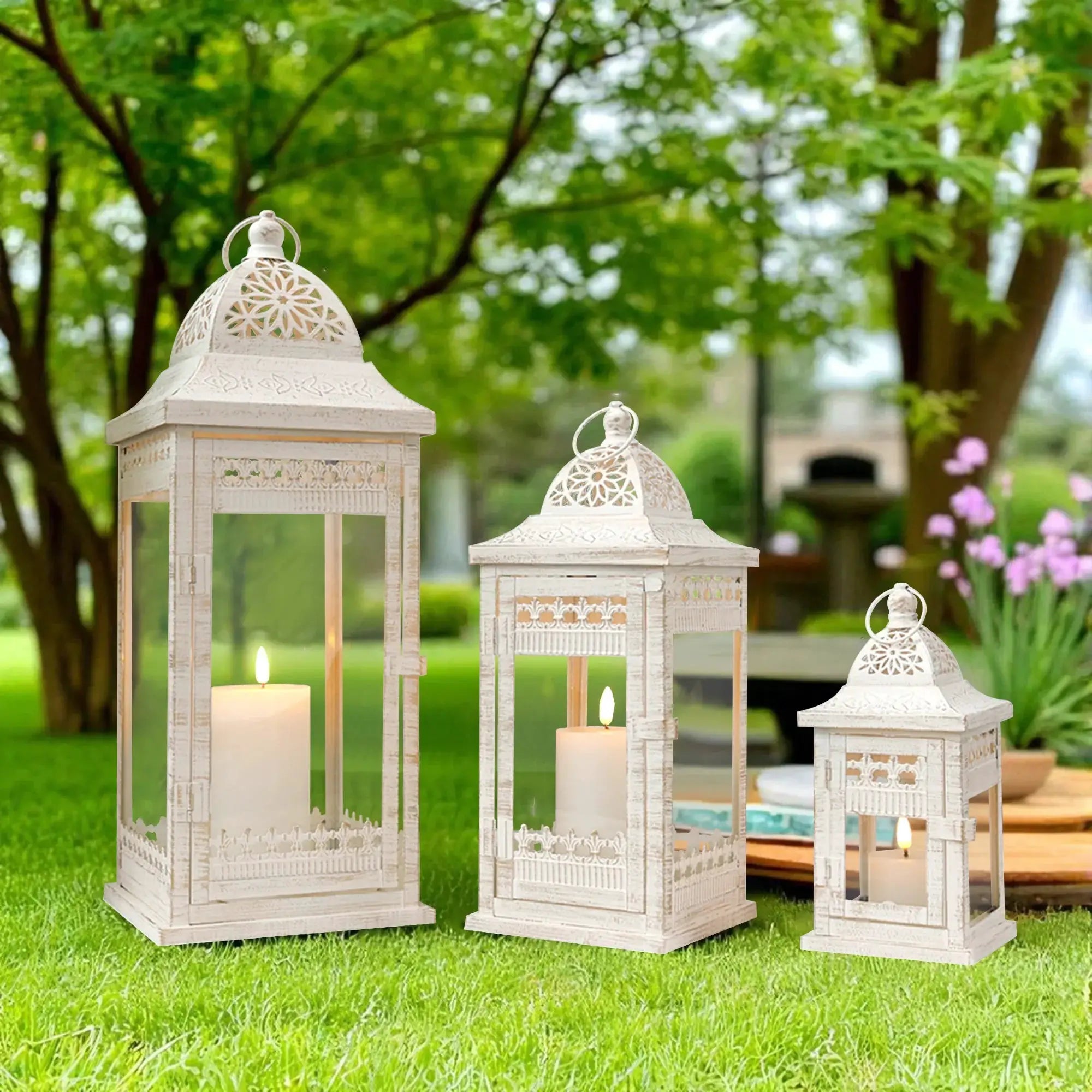 JHY DESIGN decorative candle lanterns set of 3; white metal with intricate lattice panels, heights 9.5, 14.5 and 20 inches.