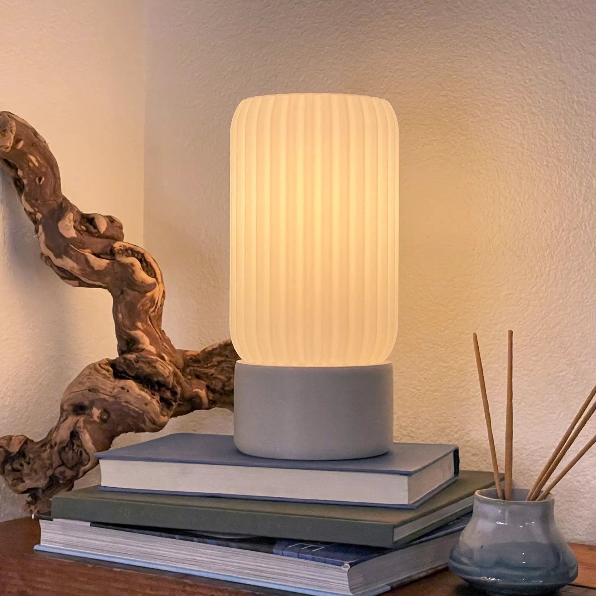 Milk Shade Barrel Table Lamp Terra Labs; ivory ribbed shade with gray base.