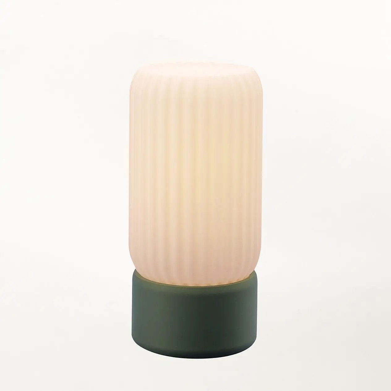 Milk Shade Barrel Table Lamp by Terra Labs; pale ribbed shade atop a dark green base