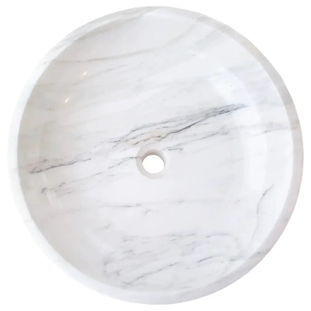 Calacatta white marble vessel sink, round above-counter bathroom basin with polished finish.