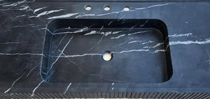 Nero Marquina marble wall-mount bathroom vanity sink with black and white veining, rectangular basin