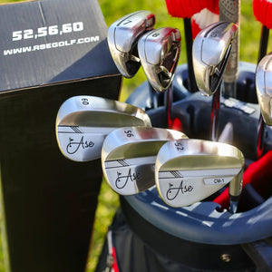 Ase Golf 3-piece wedge set in chrome finish displayed on a rack with the brand logo and ASEGOLF.COM box.