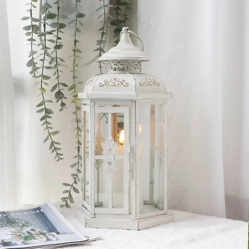 12-inch tall candle lantern in distressed white metal with gold brush accents, JHY DESIGN decorative piece