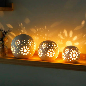 Set of 3 blue ceramic decorative lamps with floral cutout patterns; battery-operated by JHY DESIGN