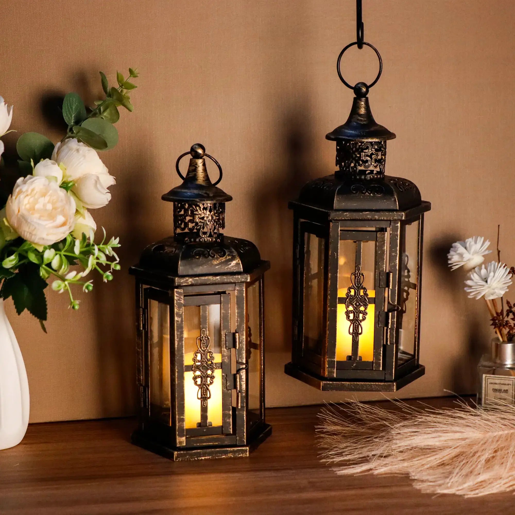 10 inch high vintage-style hanging lanterns (set of 2), decorative candle lanterns in black metal with glass panels.