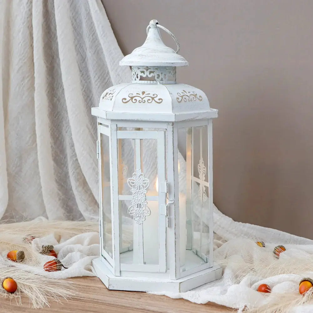12-inch tall white metal candle lantern with gold brush accents, vintage style