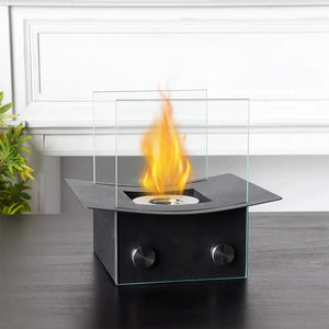 8-inch H portable tabletop fireplace with black metal body and glass windscreen, gel/ethanol flame.