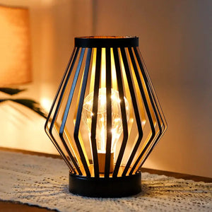 8.7-inch tall battery-powered diamond table lamp by JHY DESIGN, black metal cage with warm Edison bulb