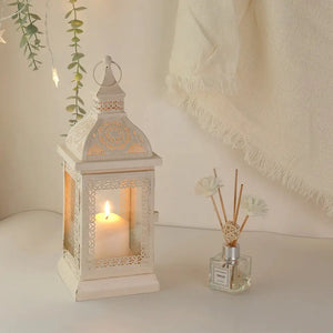 19'' cream decorative lantern by JHY DESIGN; ornate metal candle lantern with lit candle plus reed diffuser (2 items)